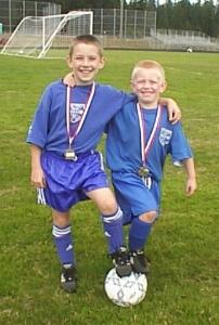 Colin and Graham with their medals