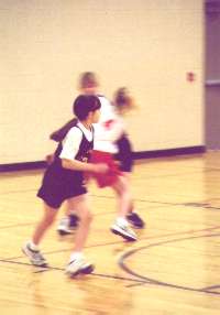 Playing basketball for St. Anthony's Hawks